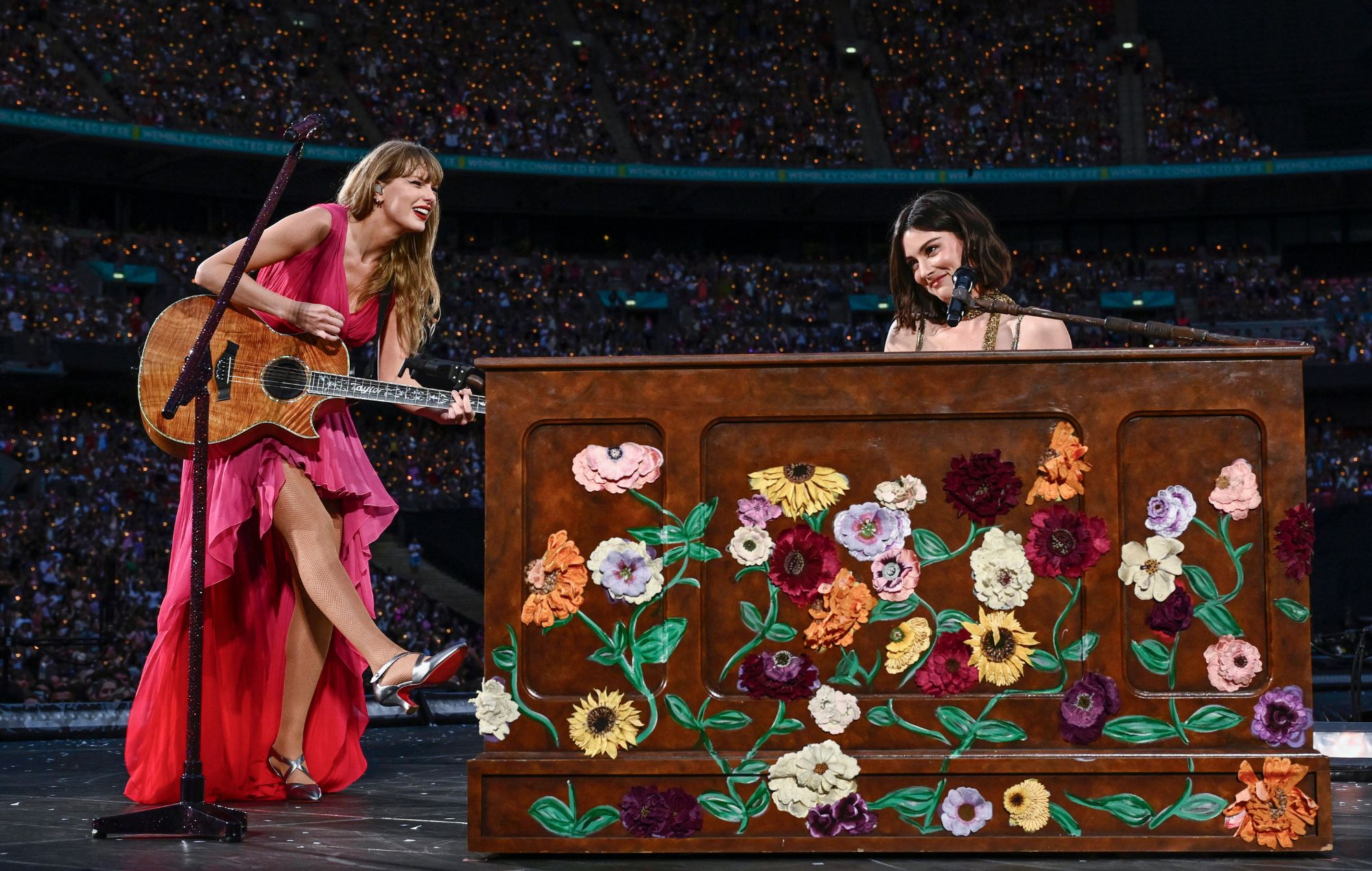 Taylor Swift and Gracie Abrams perform on stage during "Taylor Swift | The Eras Tour"