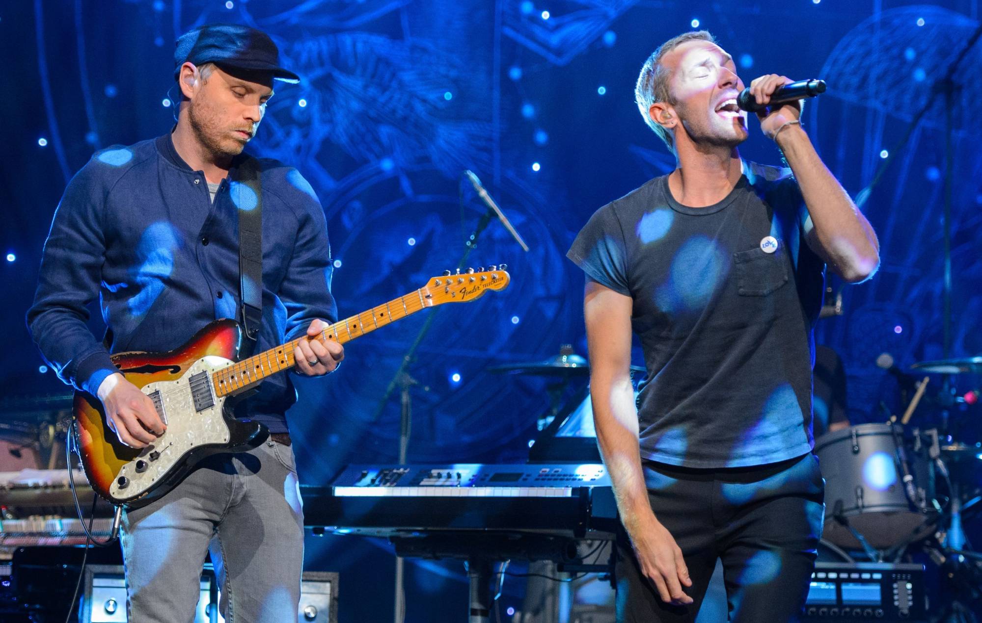 Jonny Buckland and Chris Martin of Coldplay (Photo by Dominic Lipinski/PA Images via Getty Images)