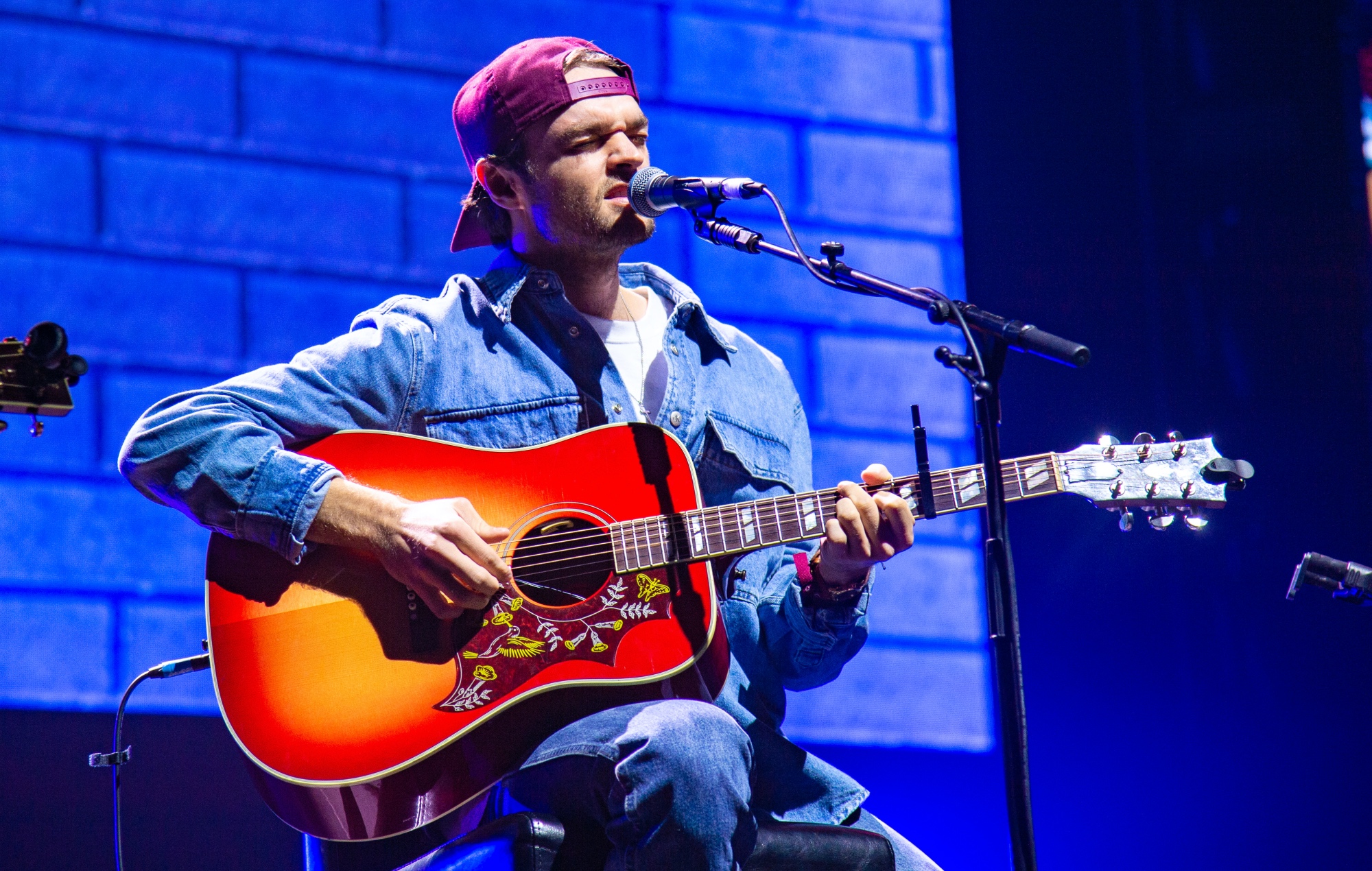Conner Smith performing live on stage, photo by Joseph Okpako/WireImage/Getty