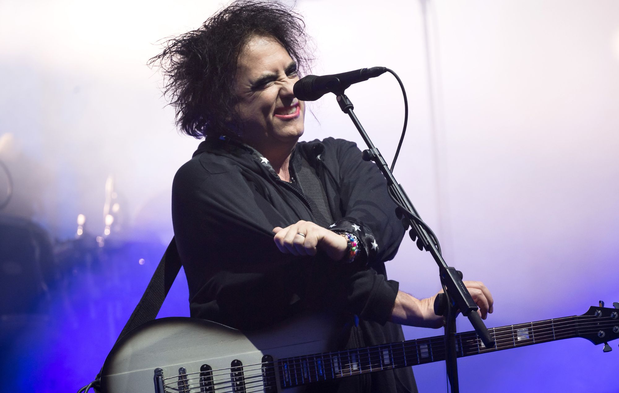 Robert Smith of The Cure performs live