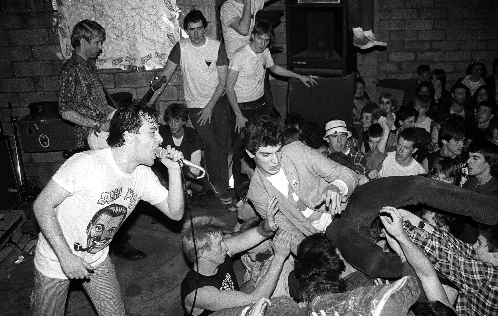 Jello Biafra and East Bay Ray performing live on stage with Dead Kennedys in 1983, photo by Larry Hulst/Michael Ochs Archives/Getty