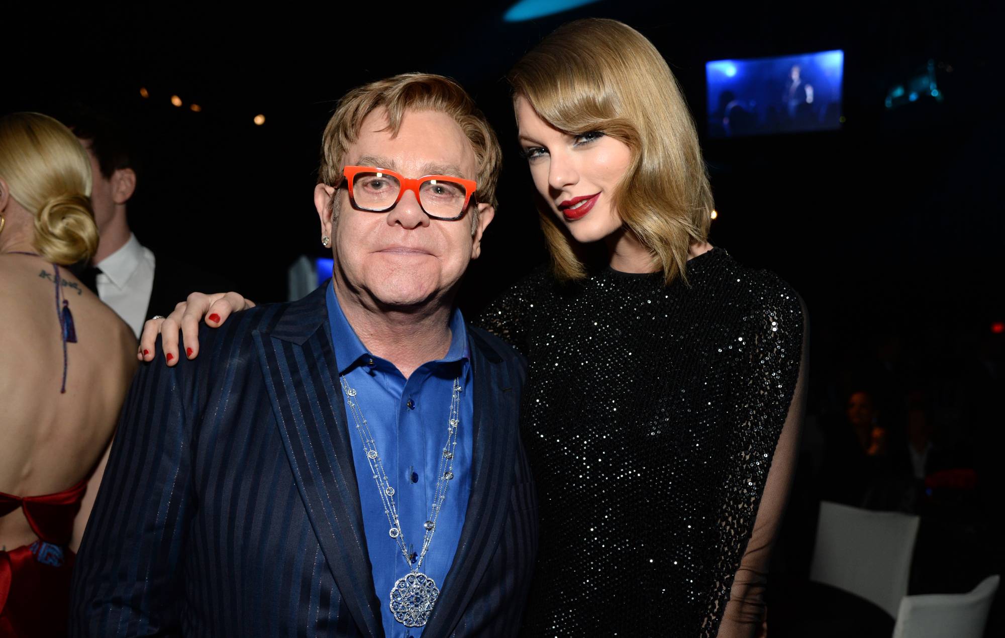  Sir Elton John and Taylor Swift attend the 22nd Annual Elton John AIDS Foundation Academy Awards Viewing Party at The City of West Hollywood Park on March 2, 2014 in West Hollywood, California. (Photo by Michael Kovac/Getty Images for EJAF)