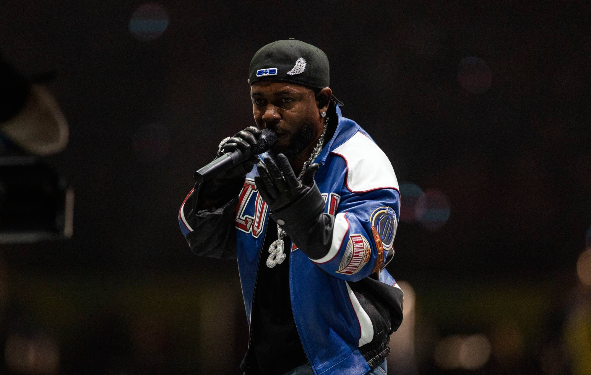 Kendrick Lamar performing live on stage at the Super Bowl