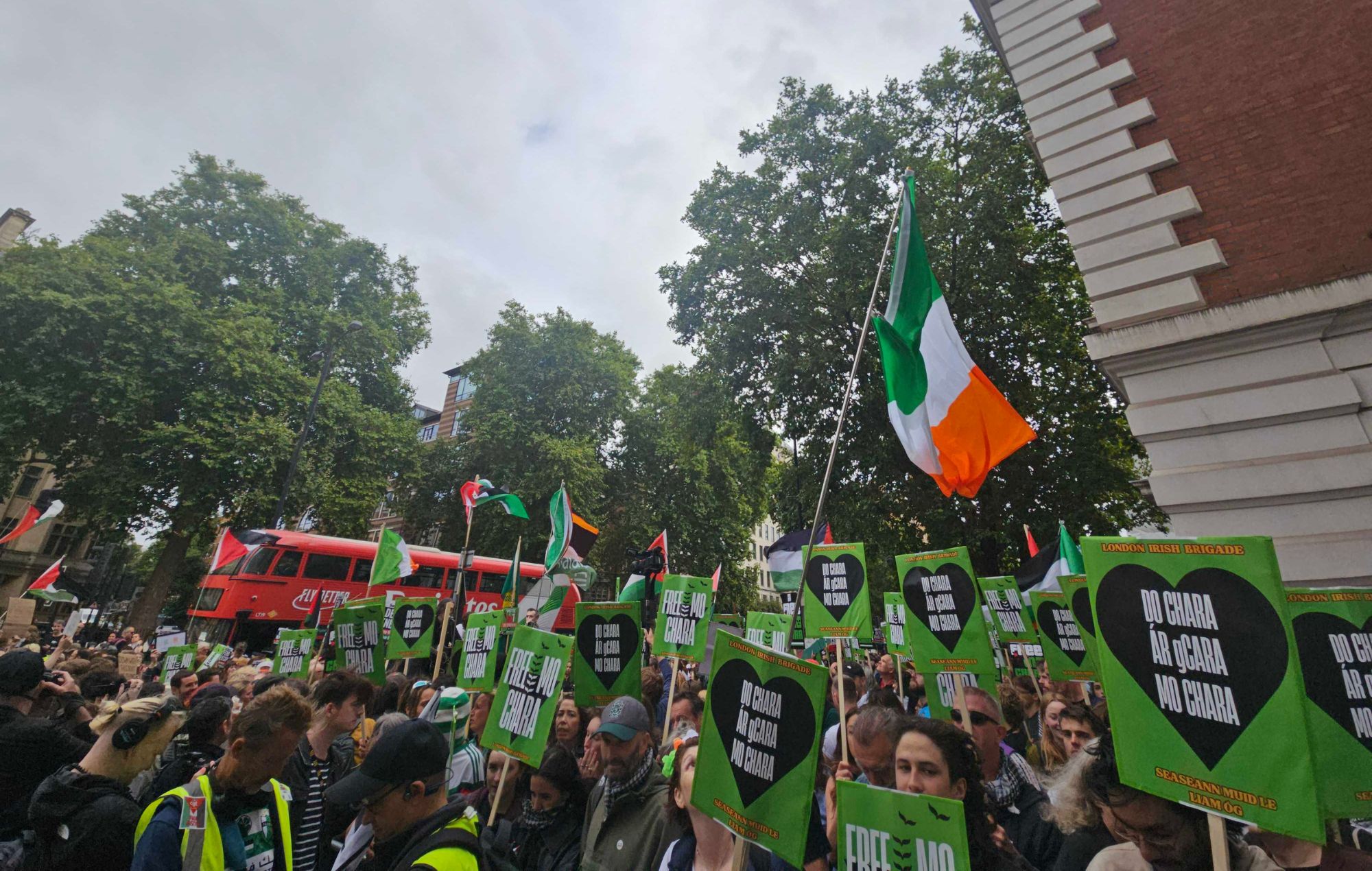 Crowds gather as Kneecap's Mo Chara appears in Court, August 20. CREDIT: NME