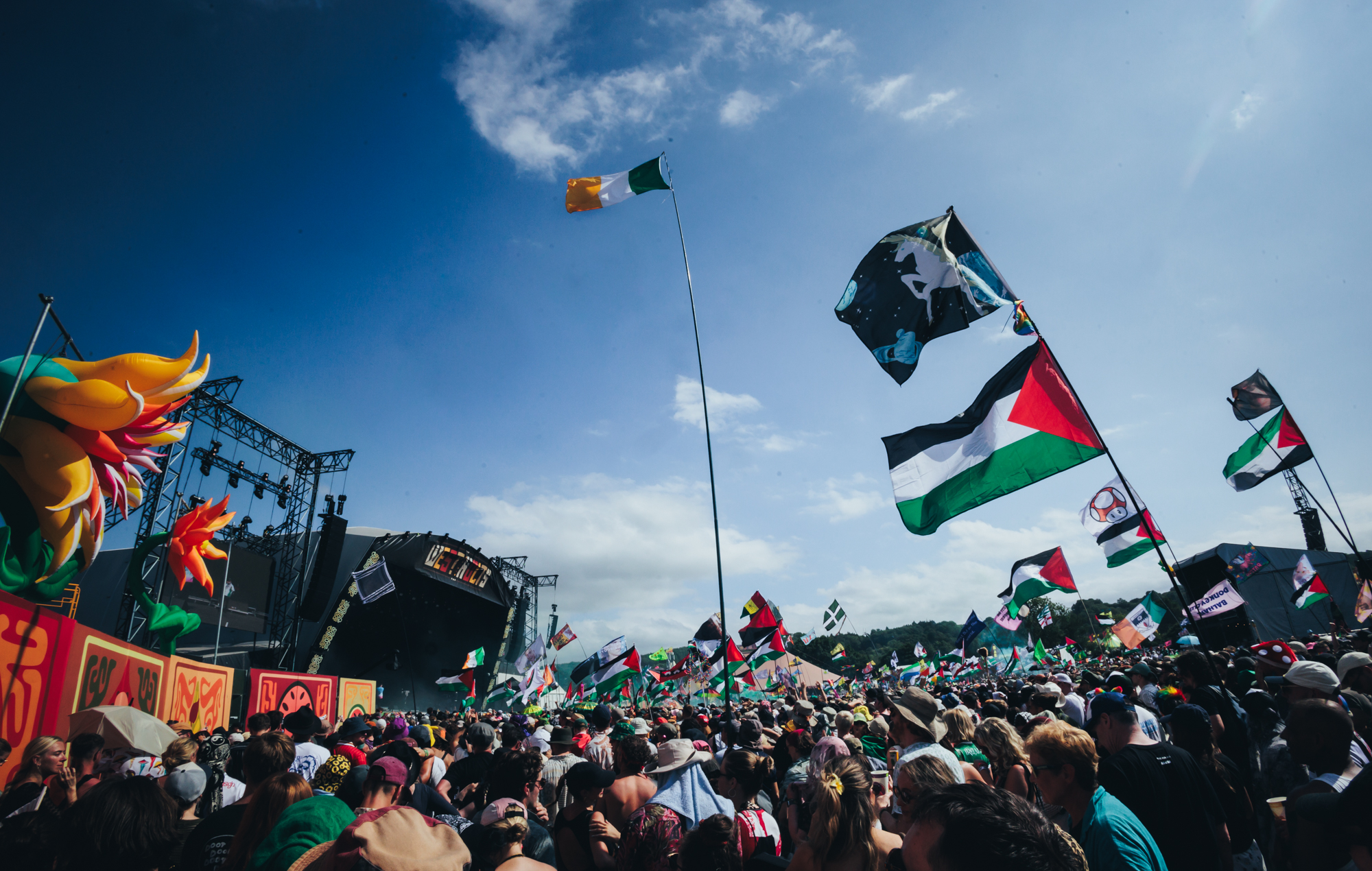Crowds at the West Holts stage as Kneecap perform at Glastonbury 2025, photo by Andy Ford