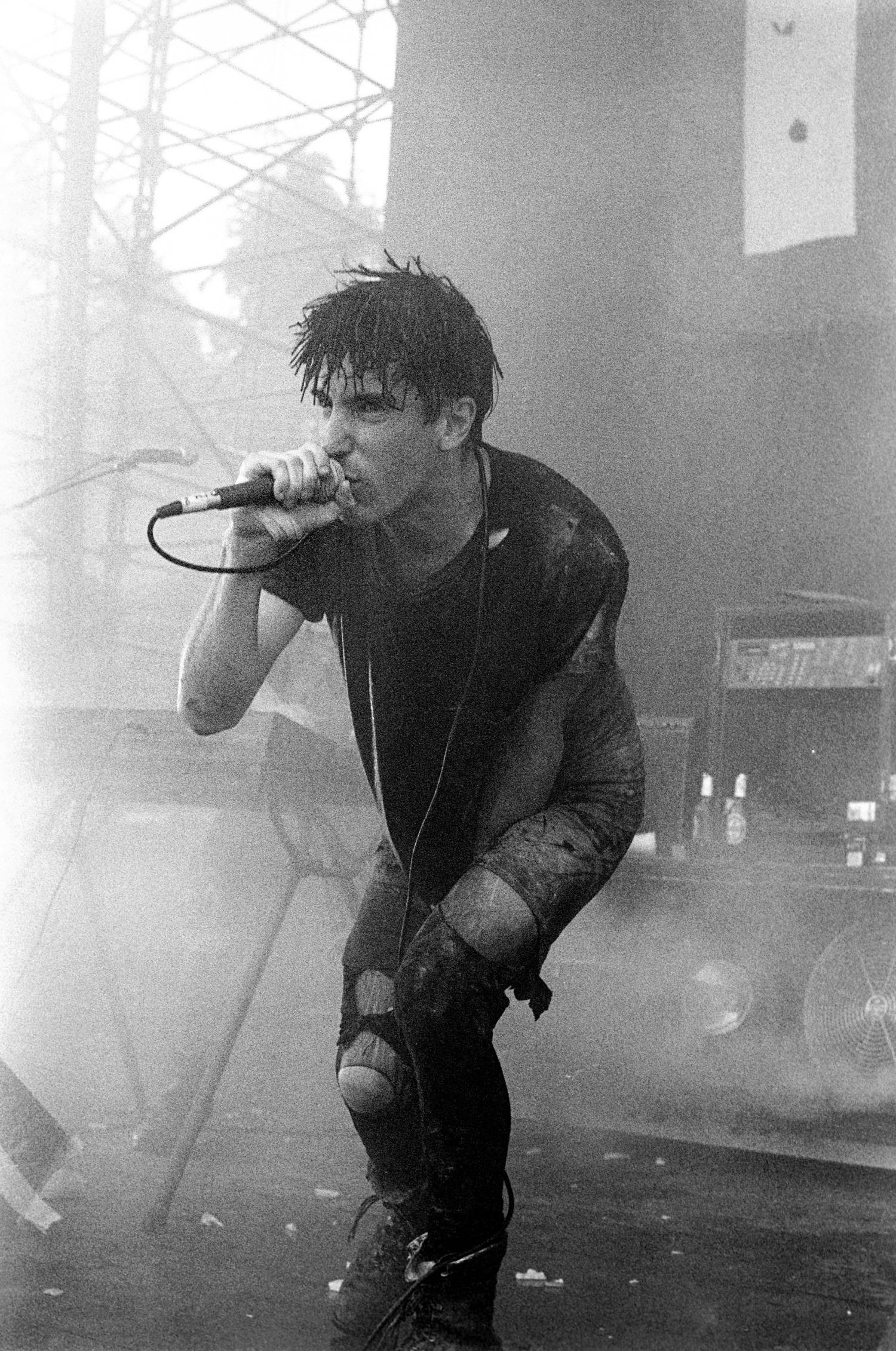 Trent Reznor performing with Nine Inch Nails at Lollapalooza in Waterloo, New Jersey on August 14, 1991. (Photo by Ebet Roberts/Redferns)