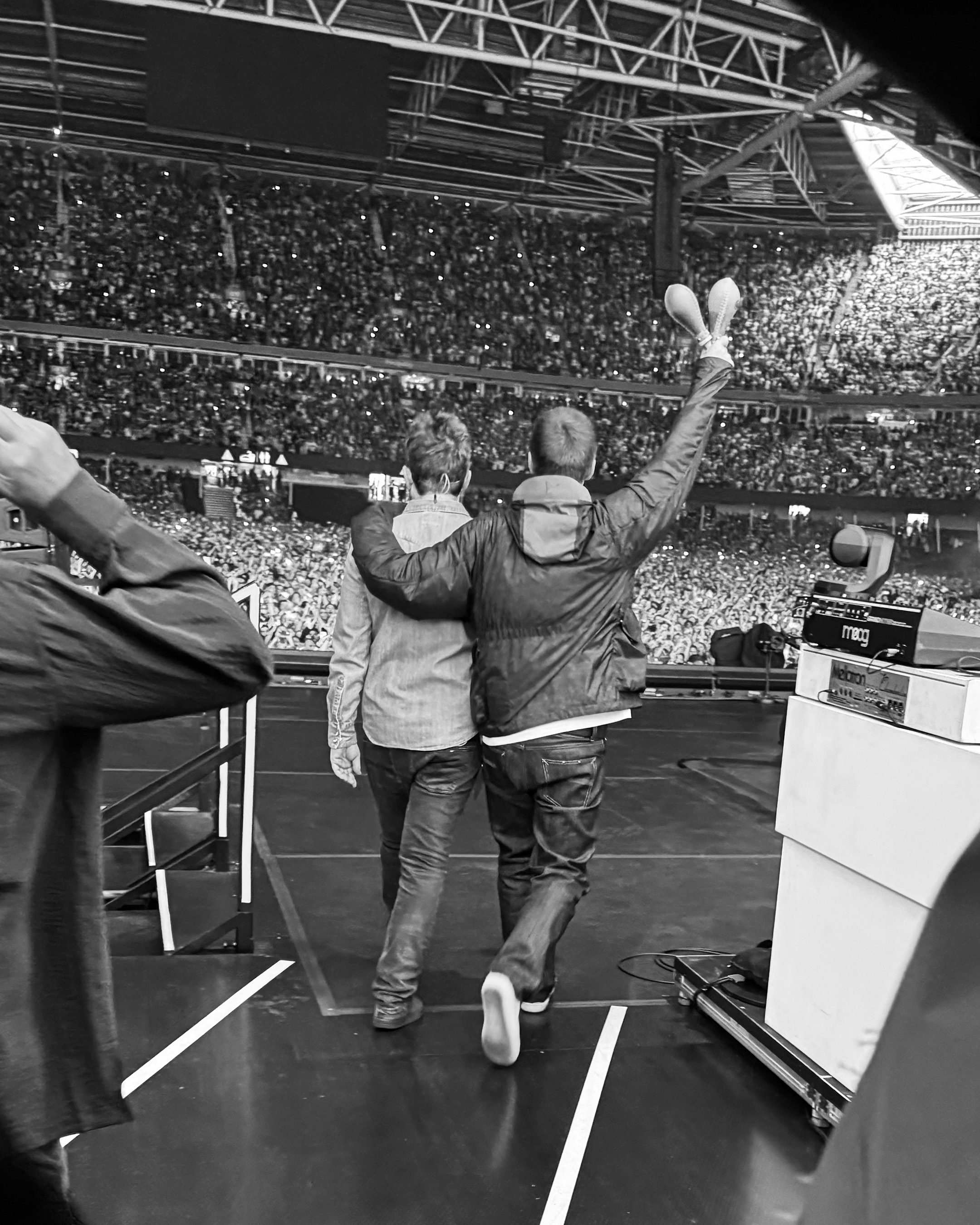Noel and Liam Gallagher performing with Oasis at Cardiff Principality Stadium on Friday July 4, 2025. Credit: Angus Jenner "OASIS PRESS PHOTO"