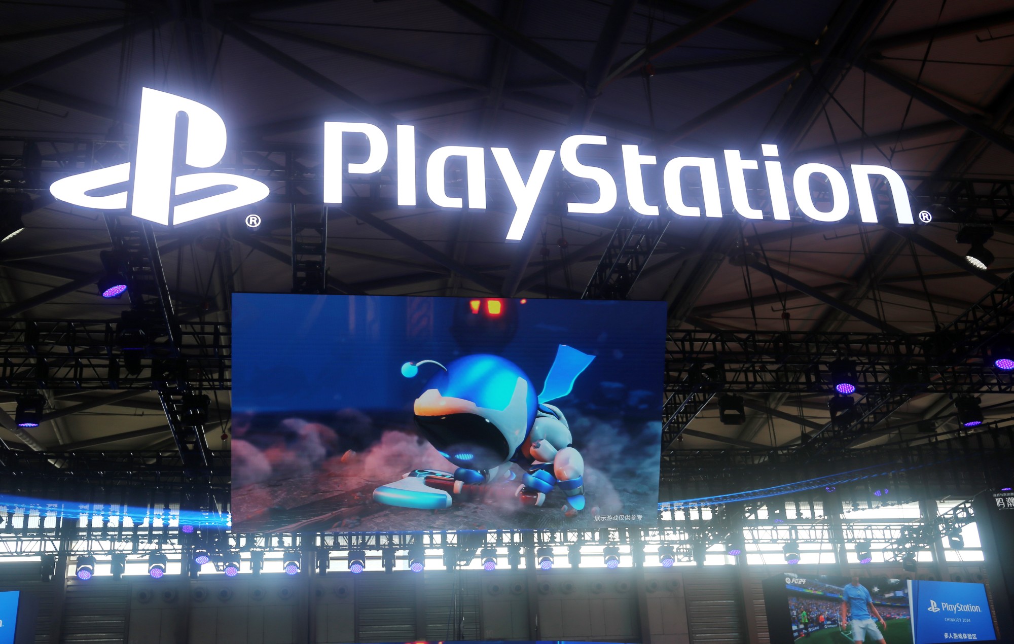 Gamers playing PlayStation's 'Astro Bot' at 2024's ChinaJoy.