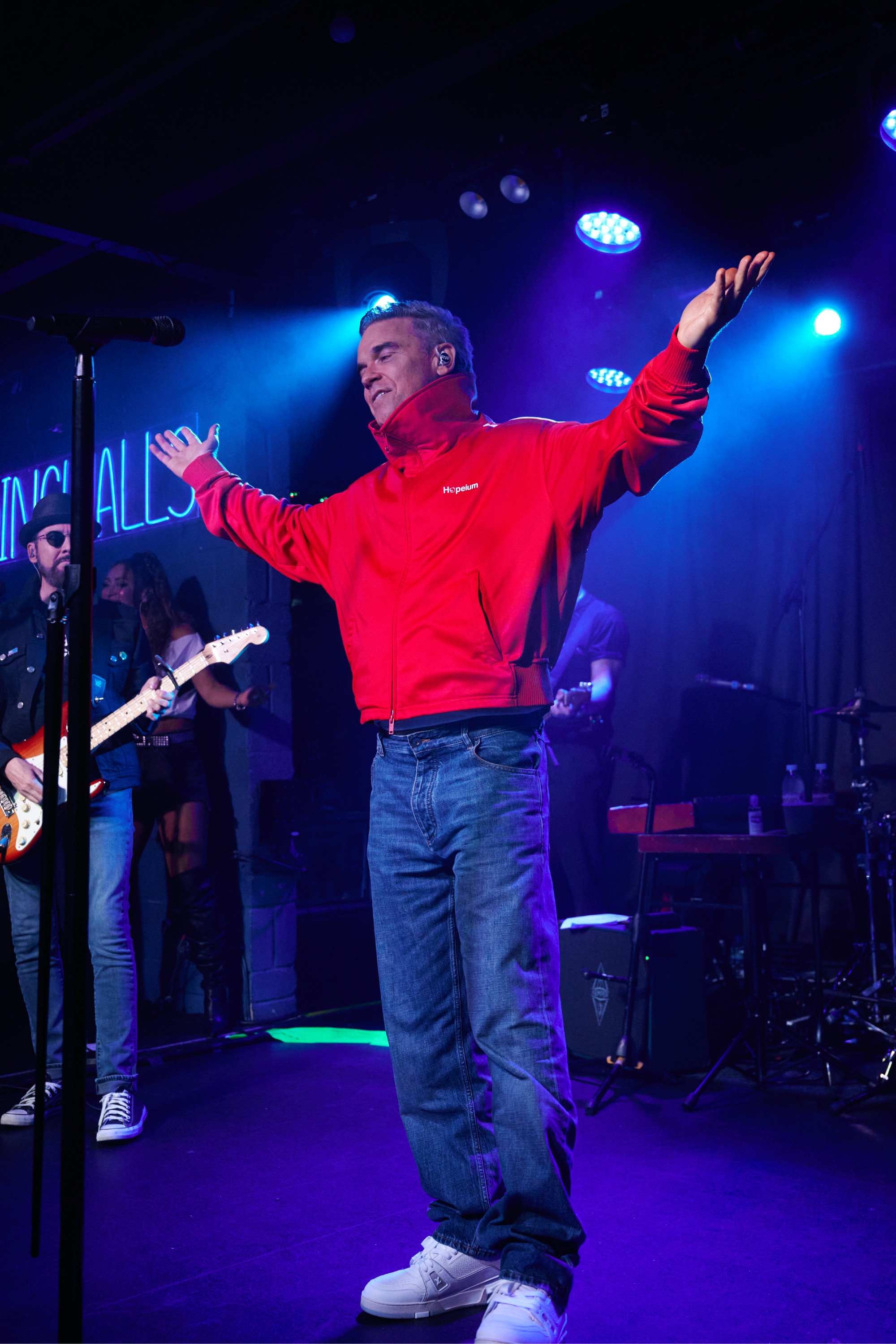 Robbie Williams performing live on stage at Dingwalls in Camden