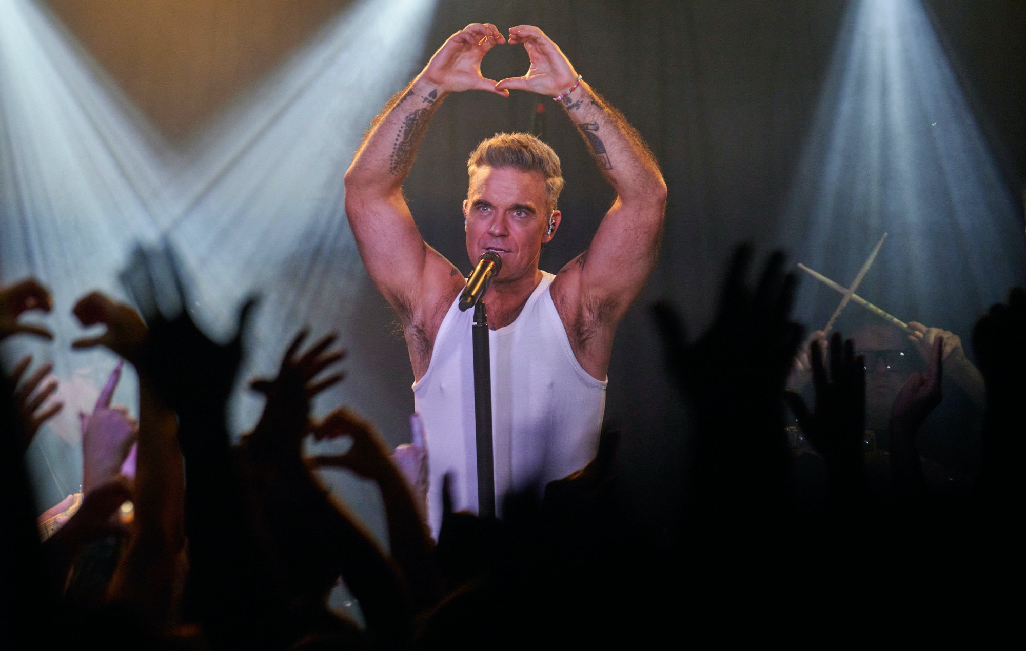 Robbie Williams performing live on stage at Dingwalls in Camden