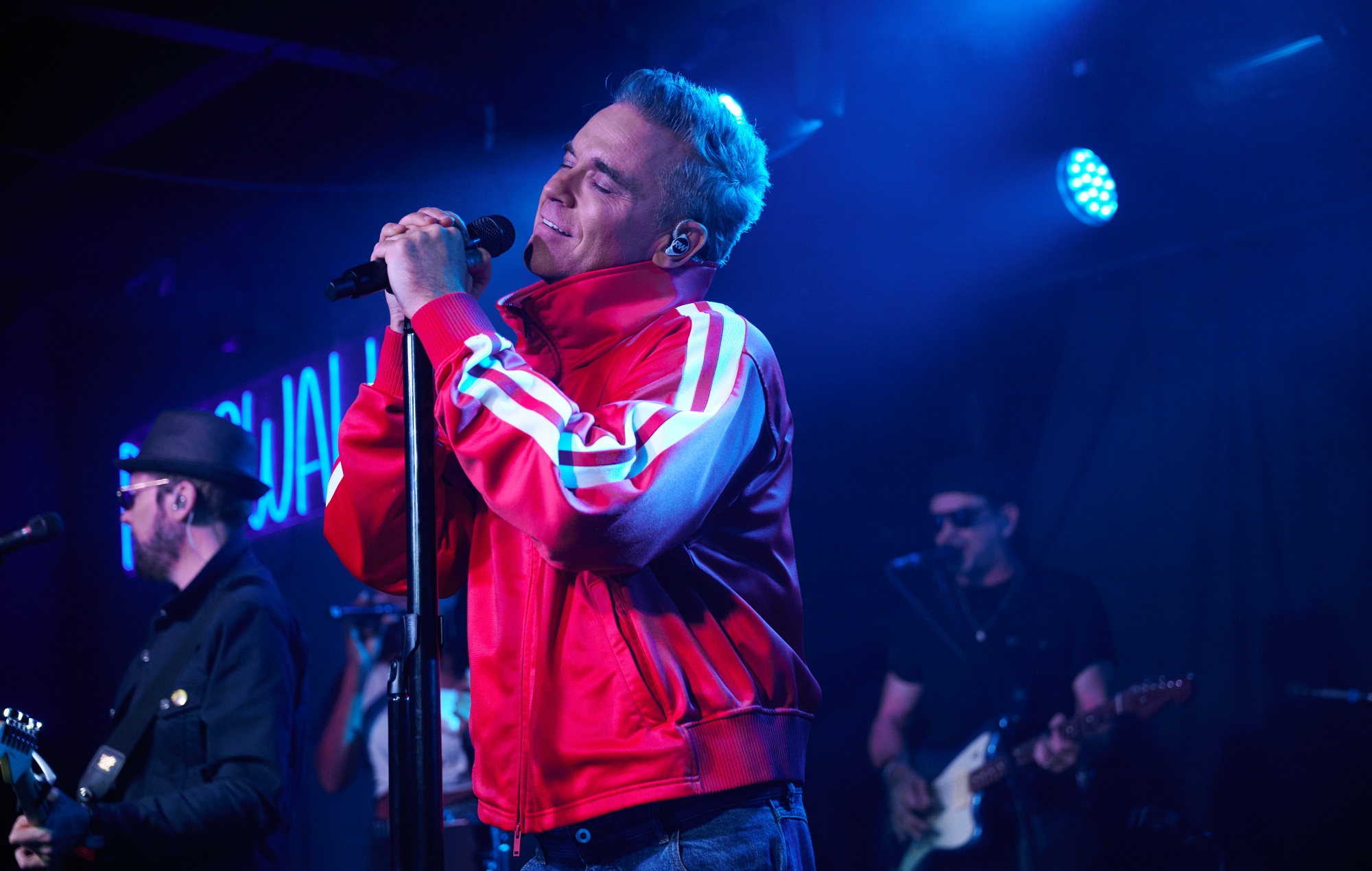 Robbie Williams performing live on stage at Dingwalls in Camden