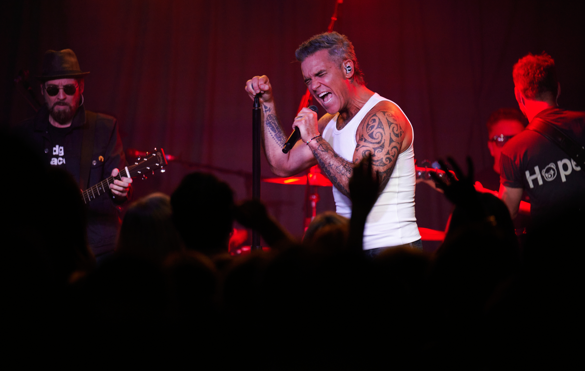 Robbie Williams performing live on stage at Dingwalls in Camden