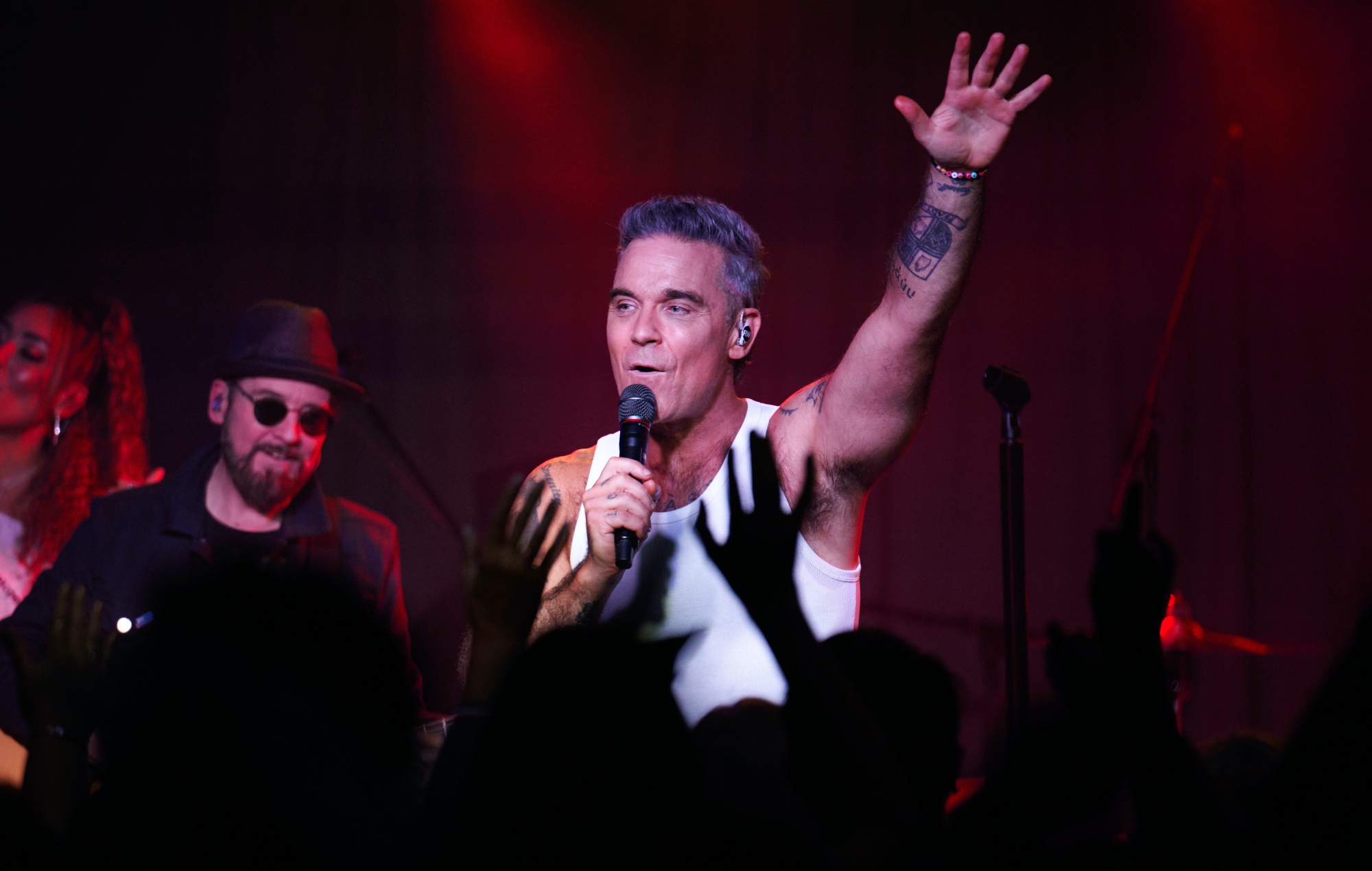 Robbie Williams performing live on stage at Dingwalls in Camden