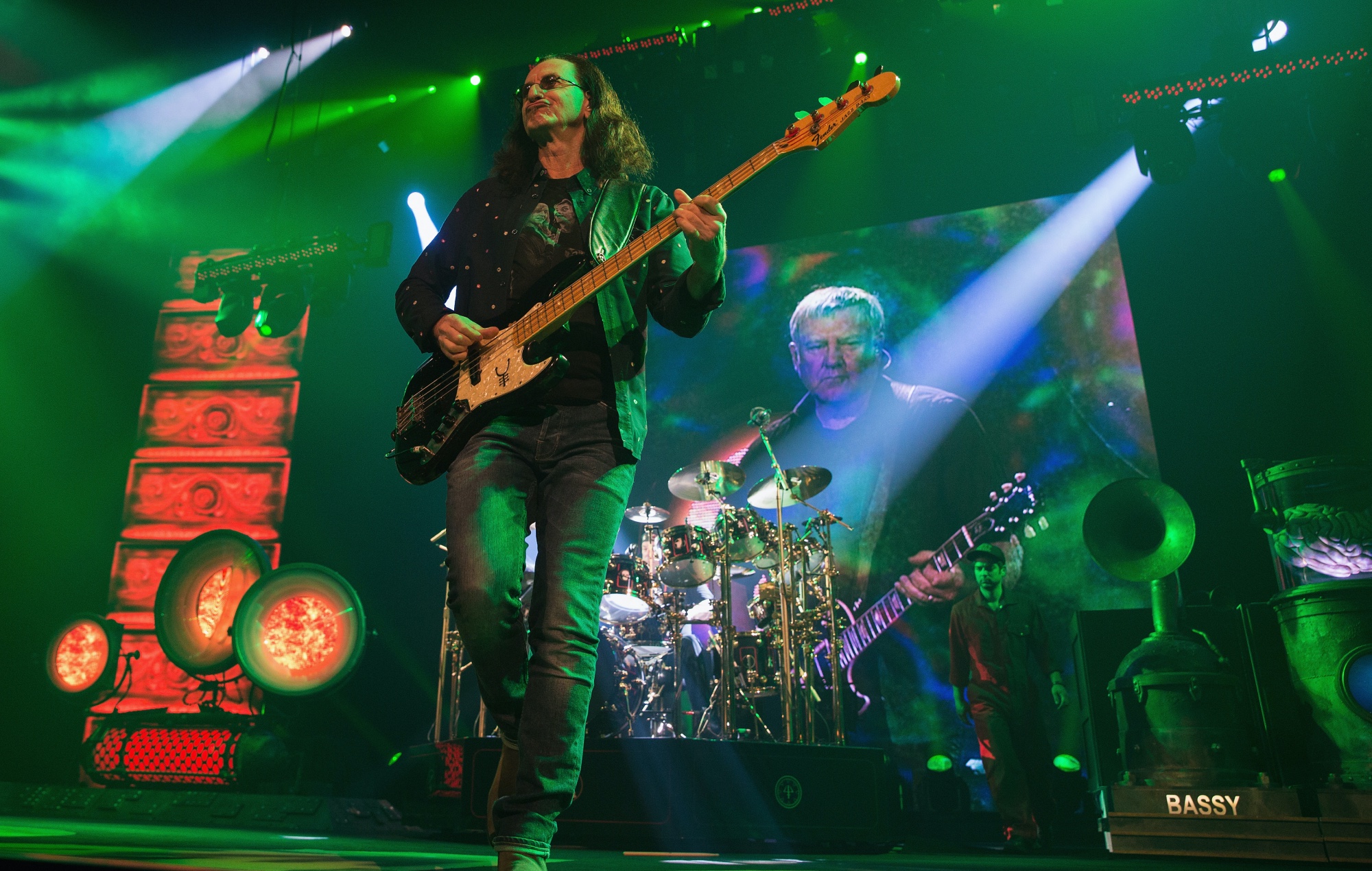 Rush performing live on stage in 2015