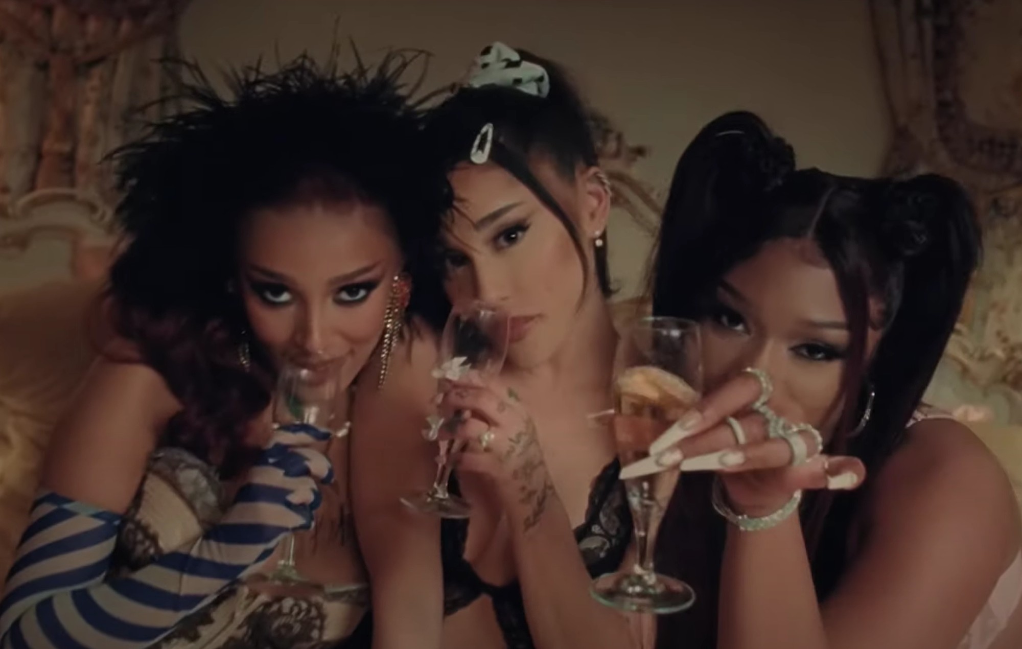 Watch Ariana Grande, Doja Cat and Megan Thee Stallion as ladies of leisure in '34+35' remix video
