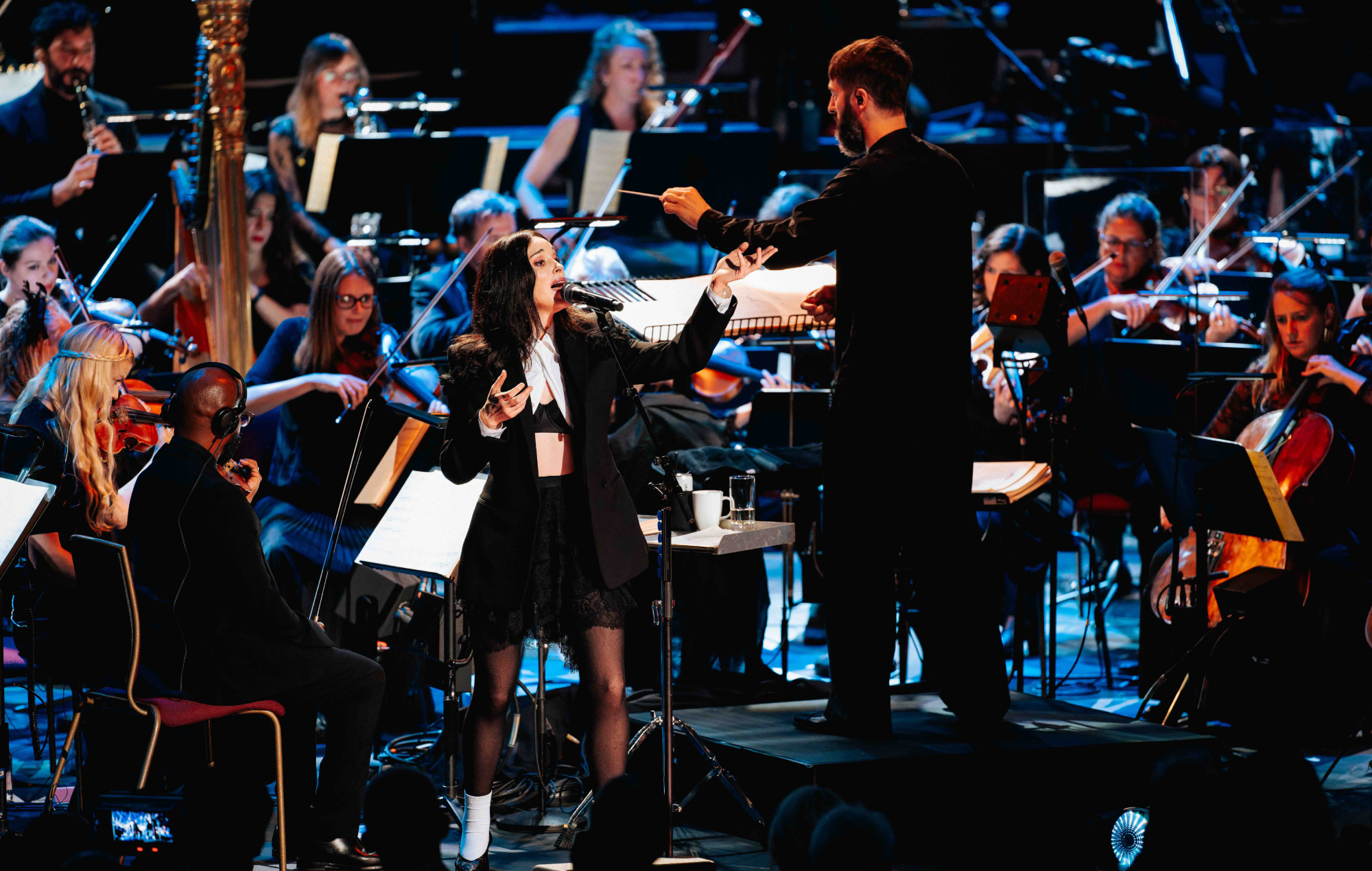 St. Vincent performing at an orchestral show, photo by Andy Paradise