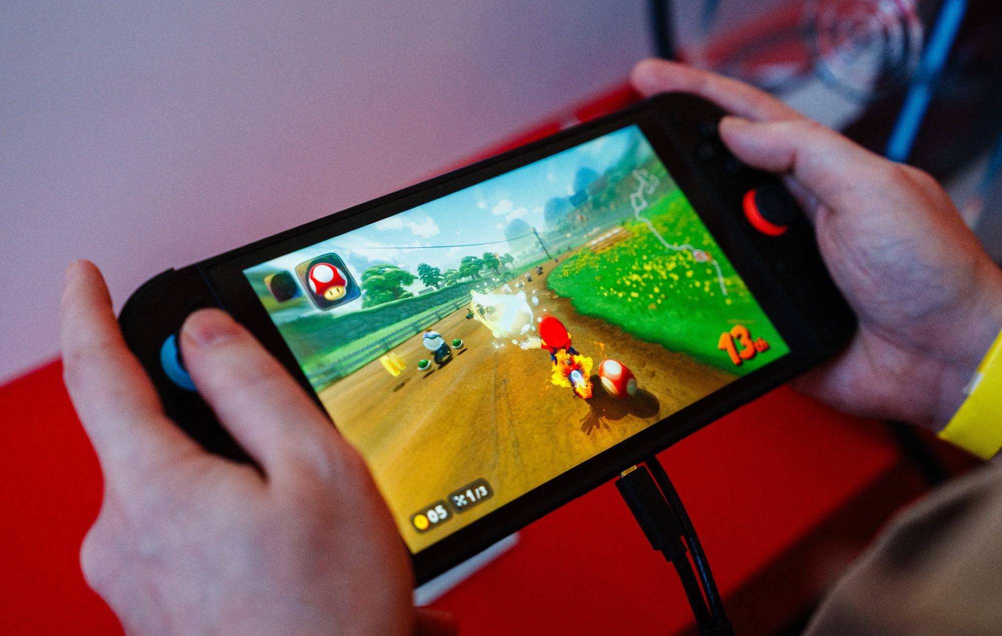 Gamer plays 'Mario Kart World' at the Switch 2 hands-on event in Paris