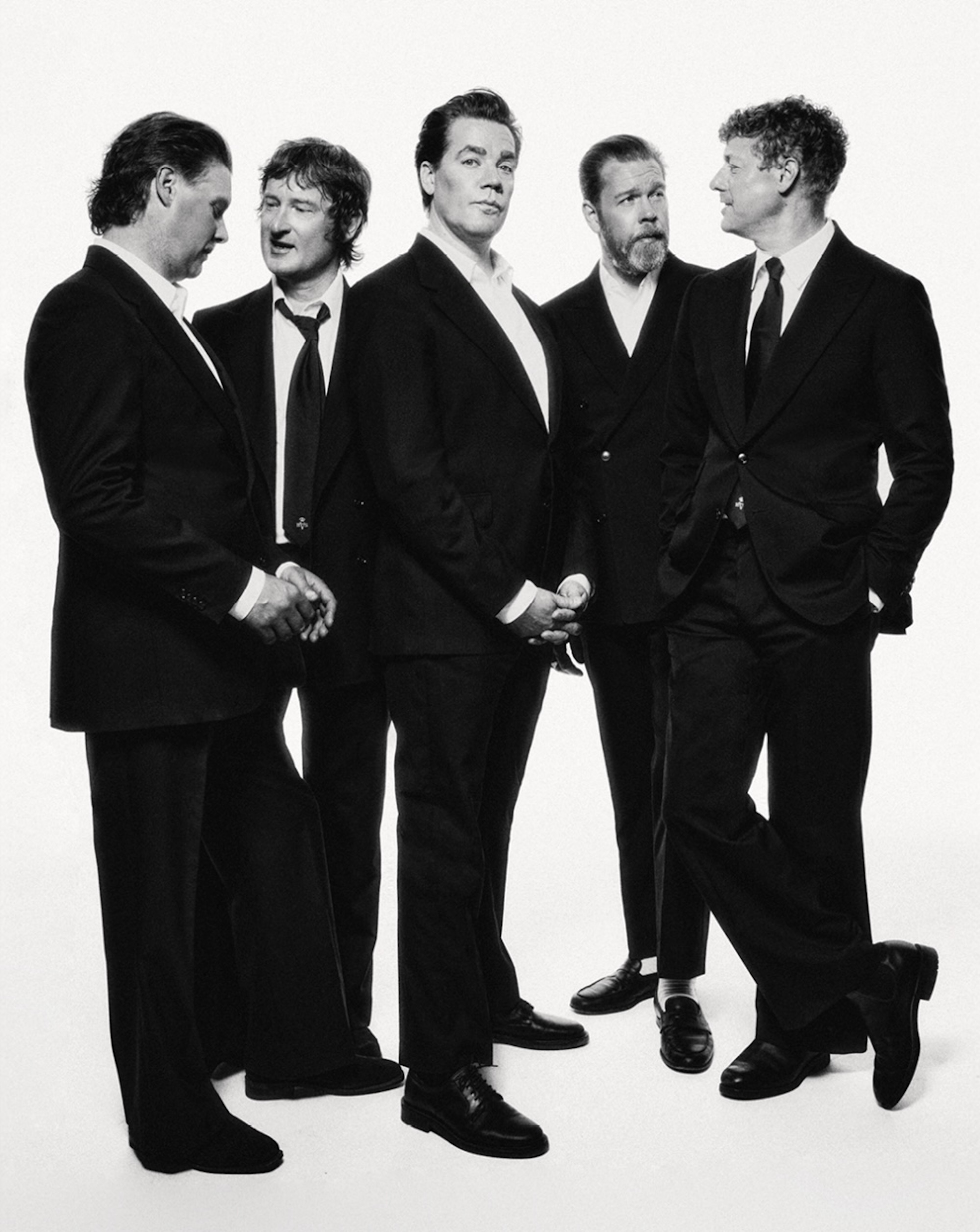 The Hives in Tiger Of Sweden suits. CREDIT: Alex Ilic
