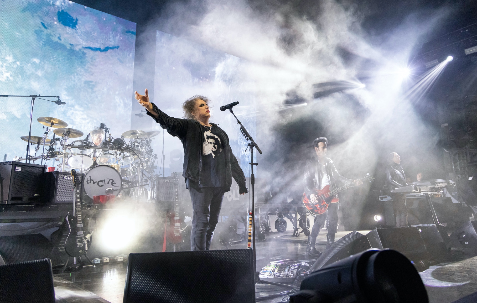 The Cure performing live on stage, photo by Scott Legato/Getty