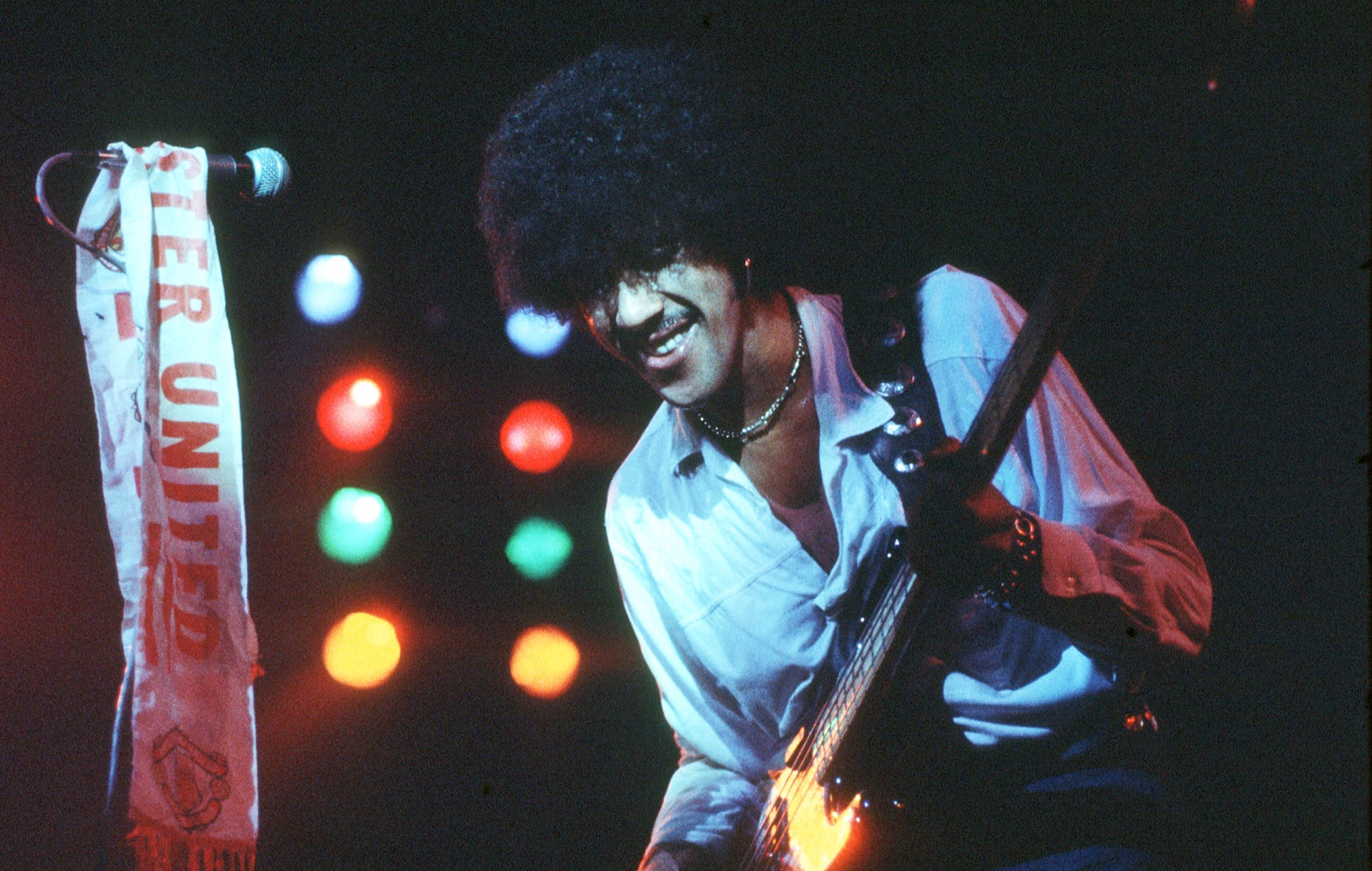 Phil Lynott performs with Thin Lizzy