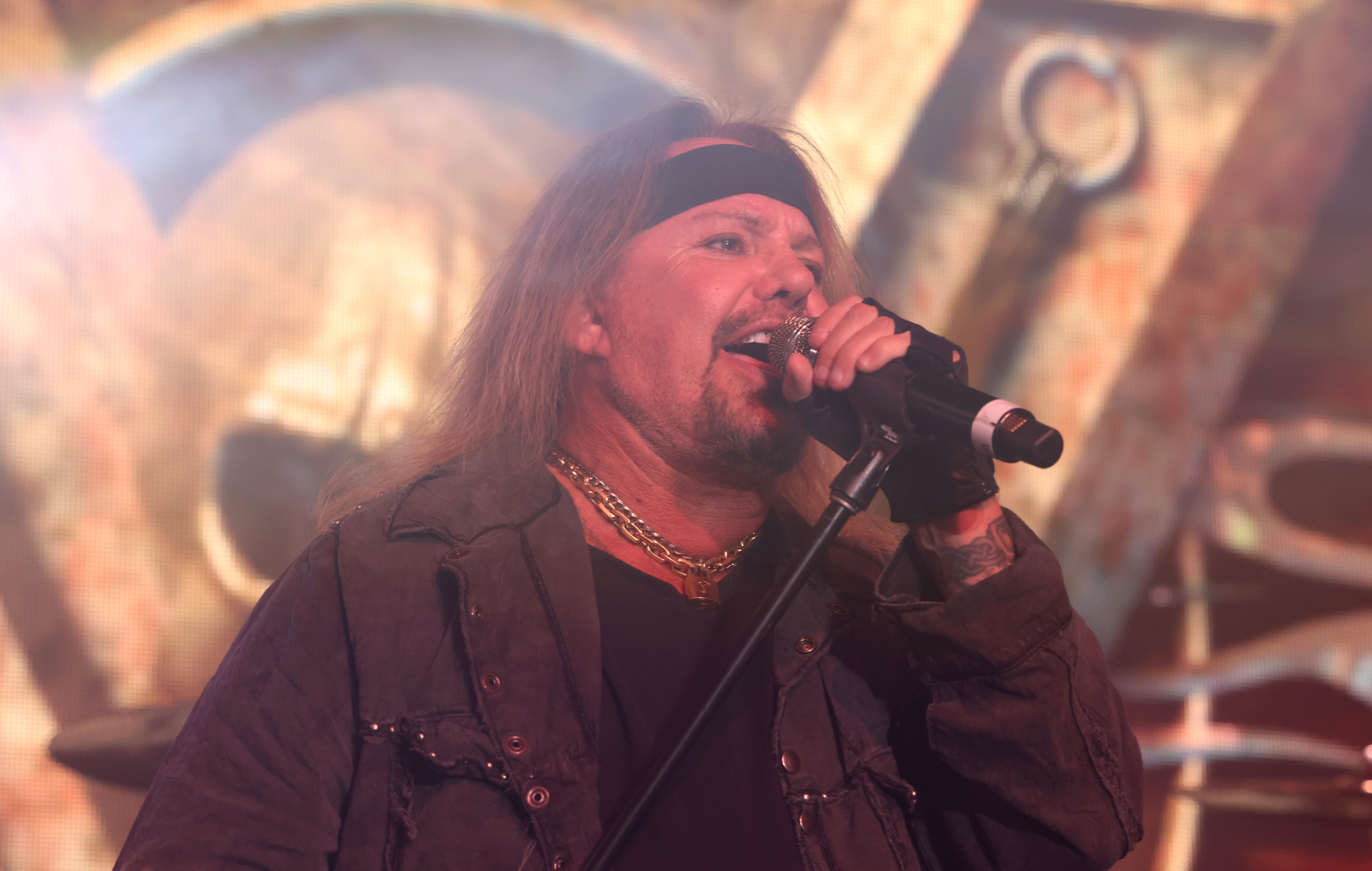 Mötley Crüe's Vince Neil performing live on stage