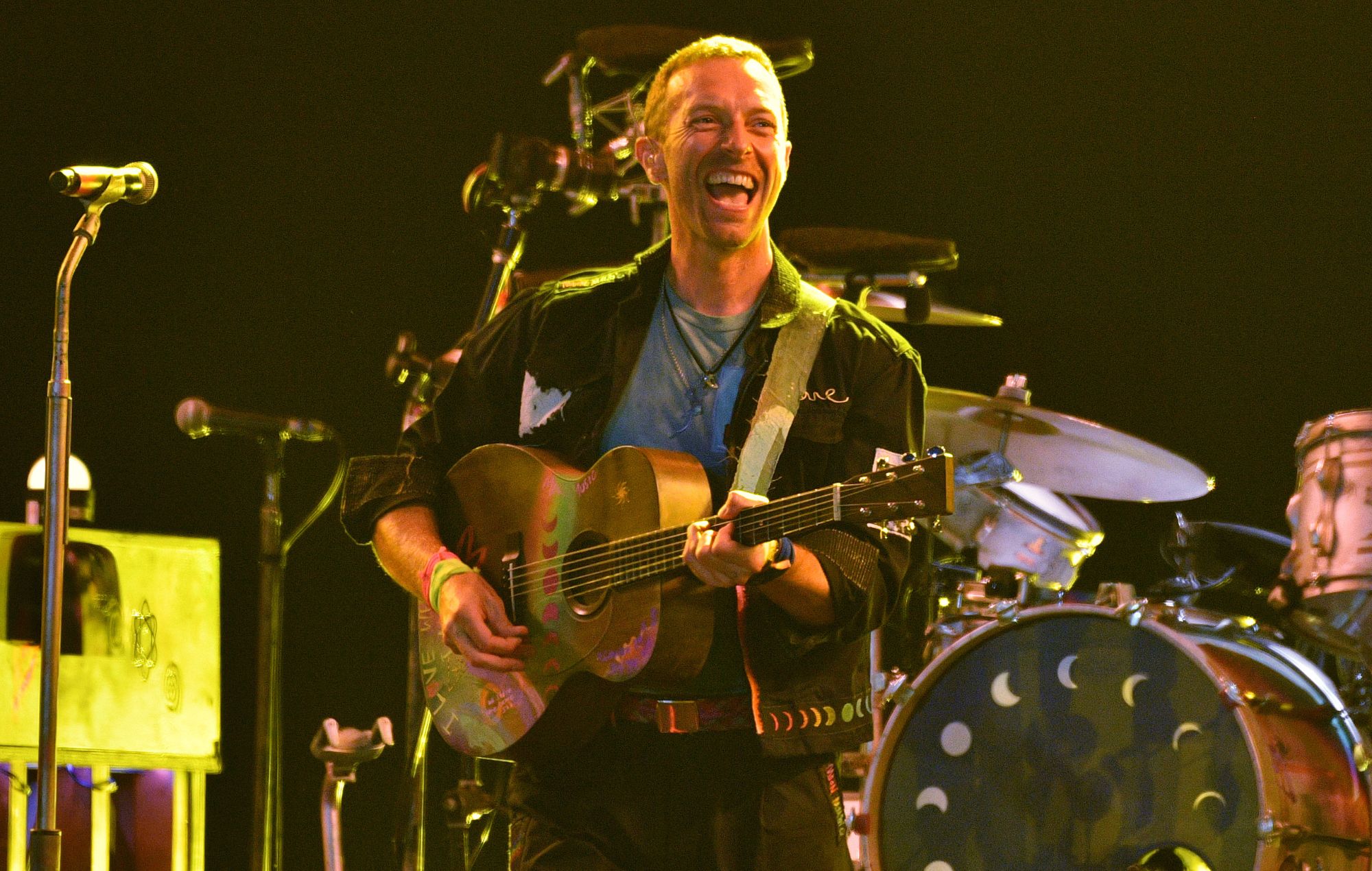 Chris Martin of Coldplay performs on the Pyramid stage during day four of Glastonbury Festival 2024