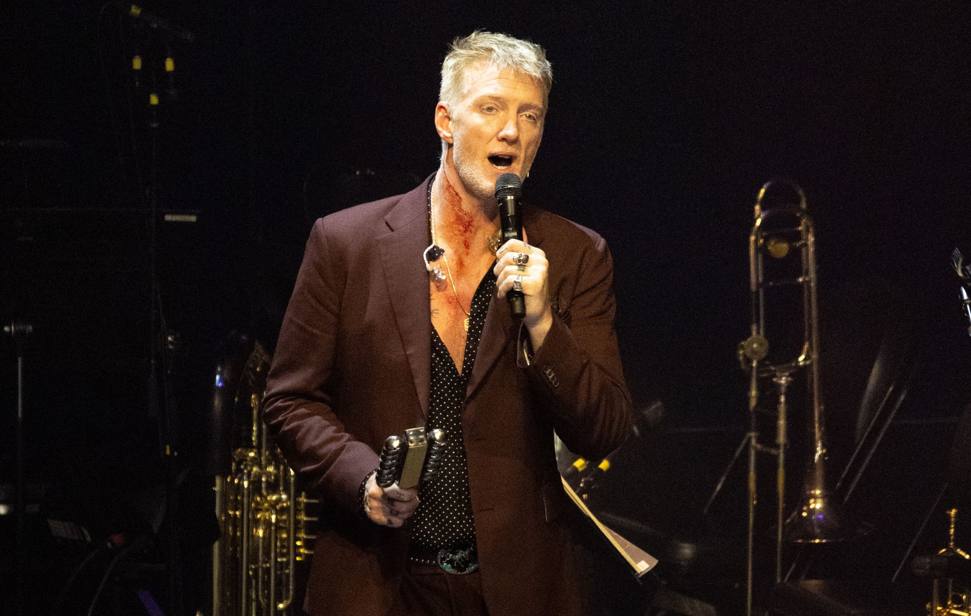 Josh Homme of Queens of the Stone Age performs live