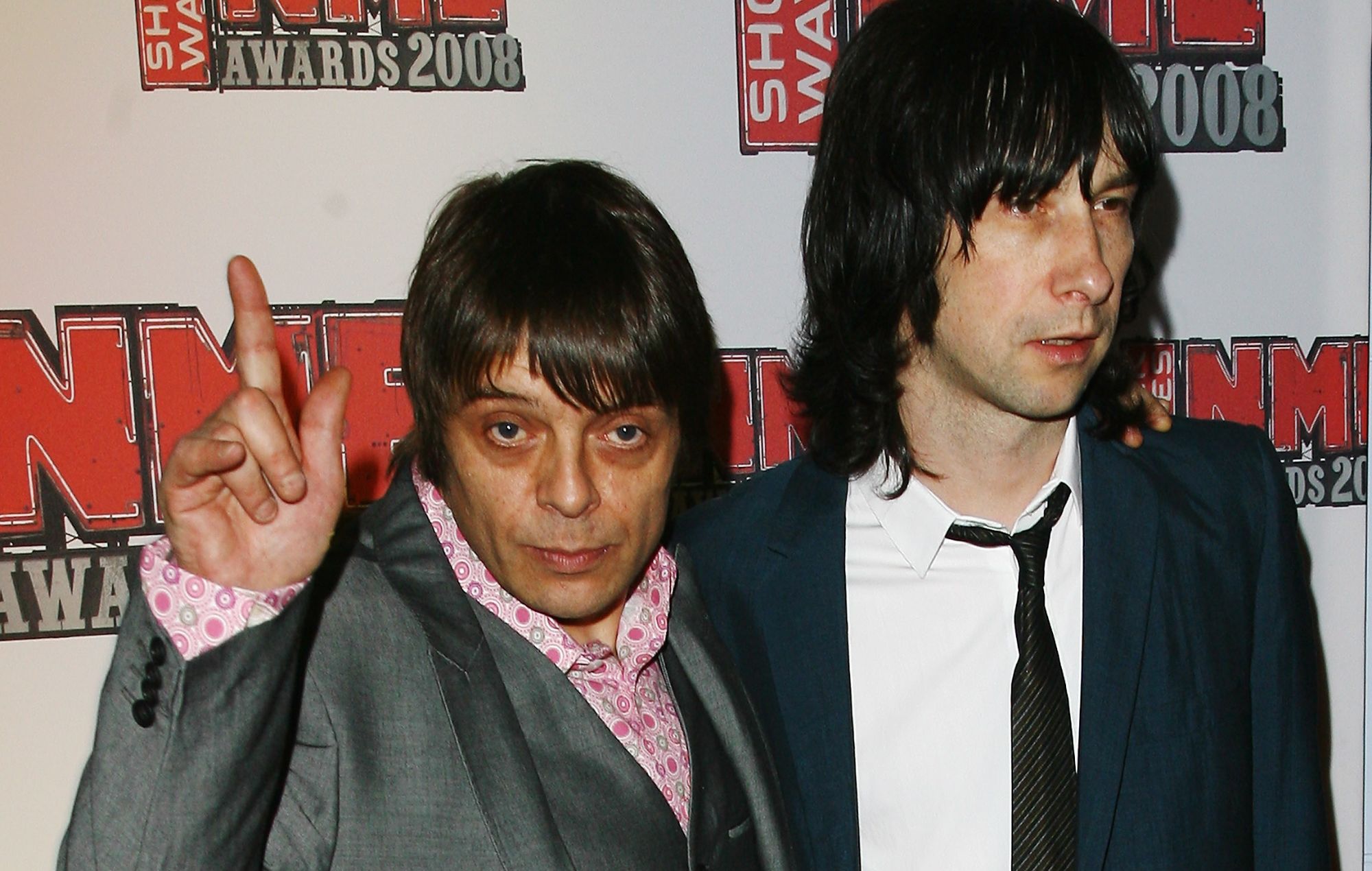 Mani and Bobby Gillespie of Primal Scream arrive at the NME Awards 2008