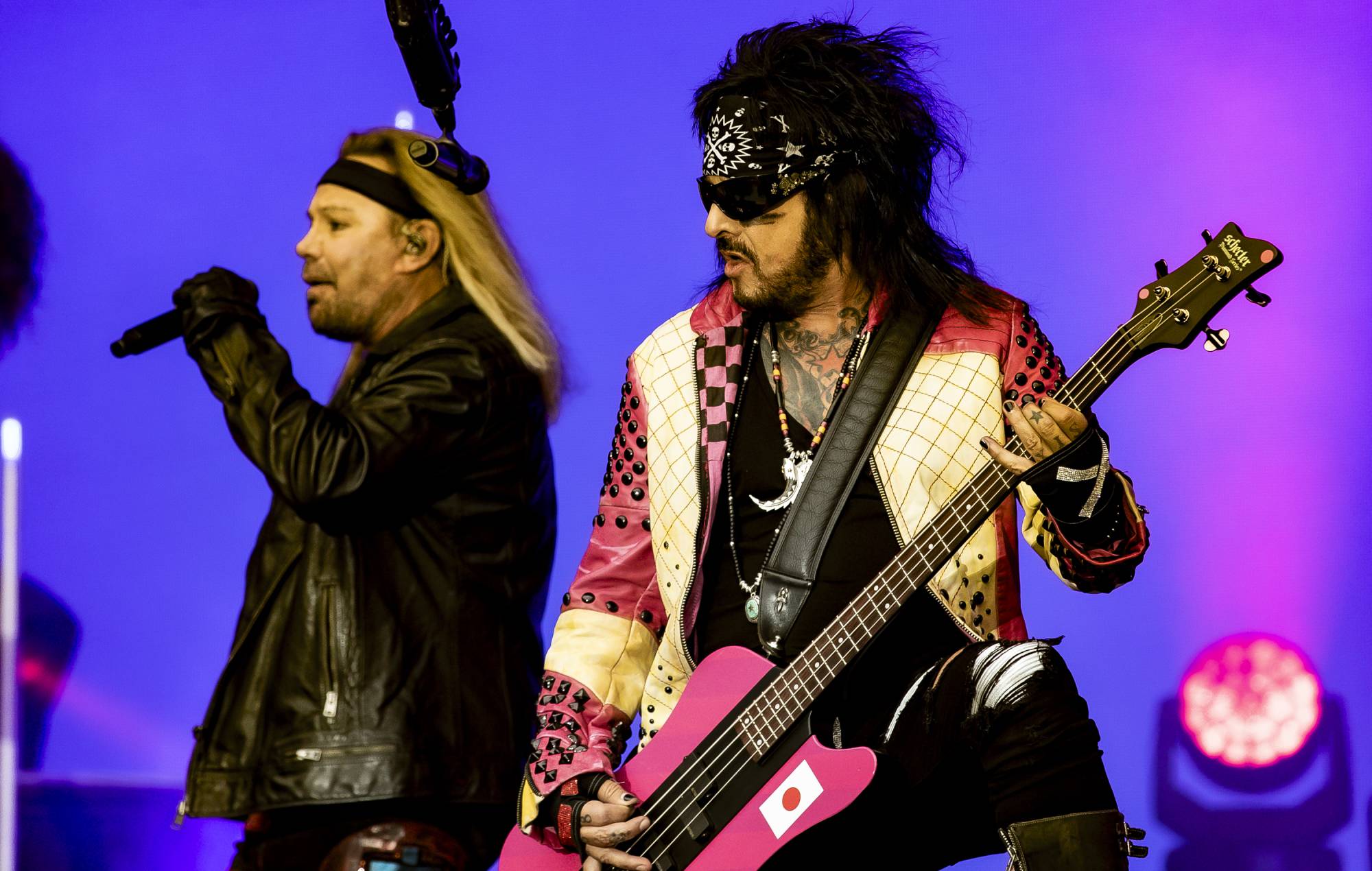 Nikki Sixx performs with Motley Crue