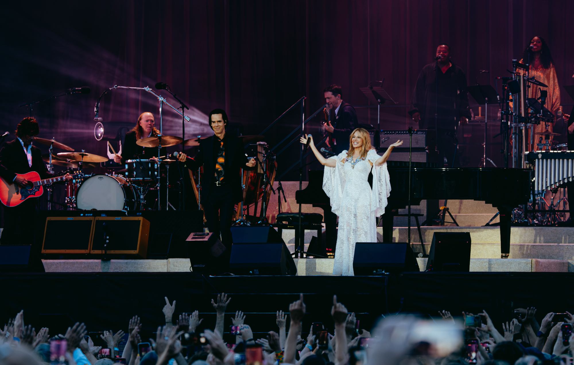 Nick Cave & The Bad Seeds with Kylie Minogue at Brighton's Preston Park. Credit: Chloe Hashemi