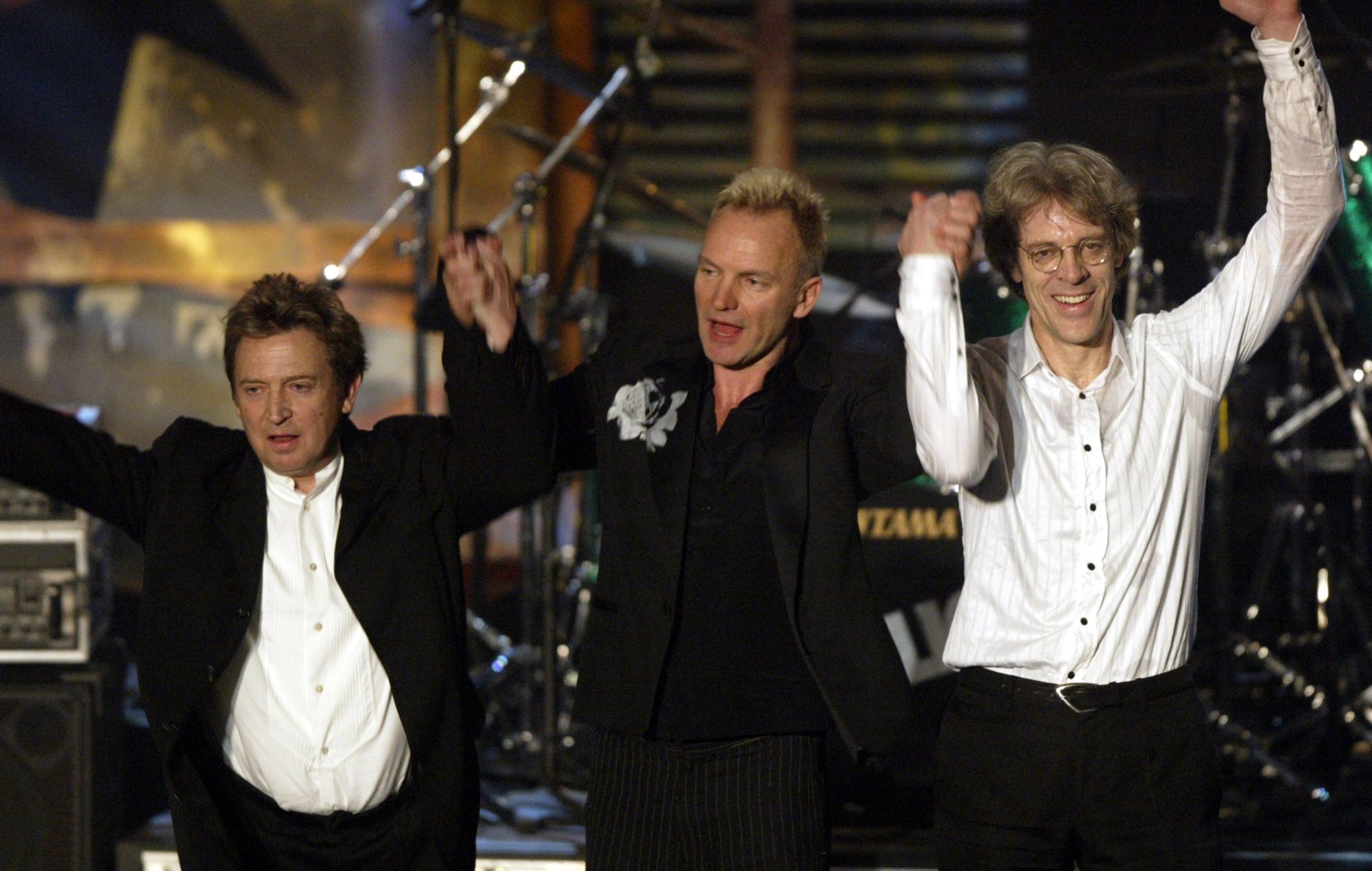 Andy Summers, Sting and Stewart Copeland of The Police at 2003 Rock Hall induction