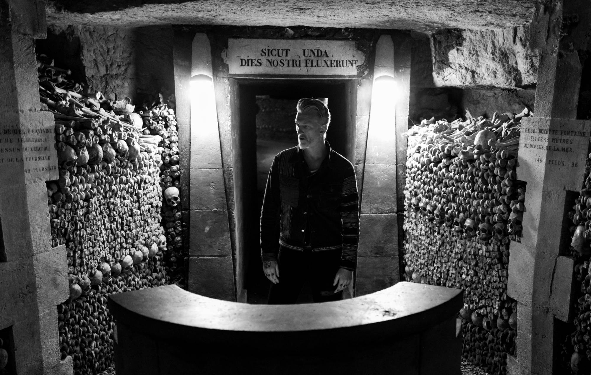 Queens Of The Stone Age's Josh Homme in the Paris Catacombs. Credit: Andreas Neuman