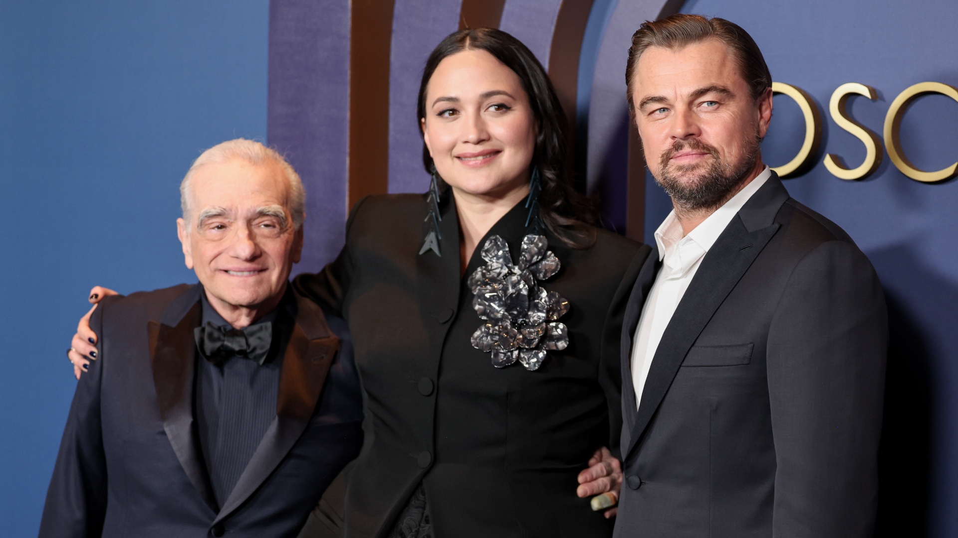 Martin Scorsese with 'Killers Of The Flower Moon' stars Lily Gladstone and Leonardo DiCaprio. CREDIT: Christopher Polk/WWD via Getty Images