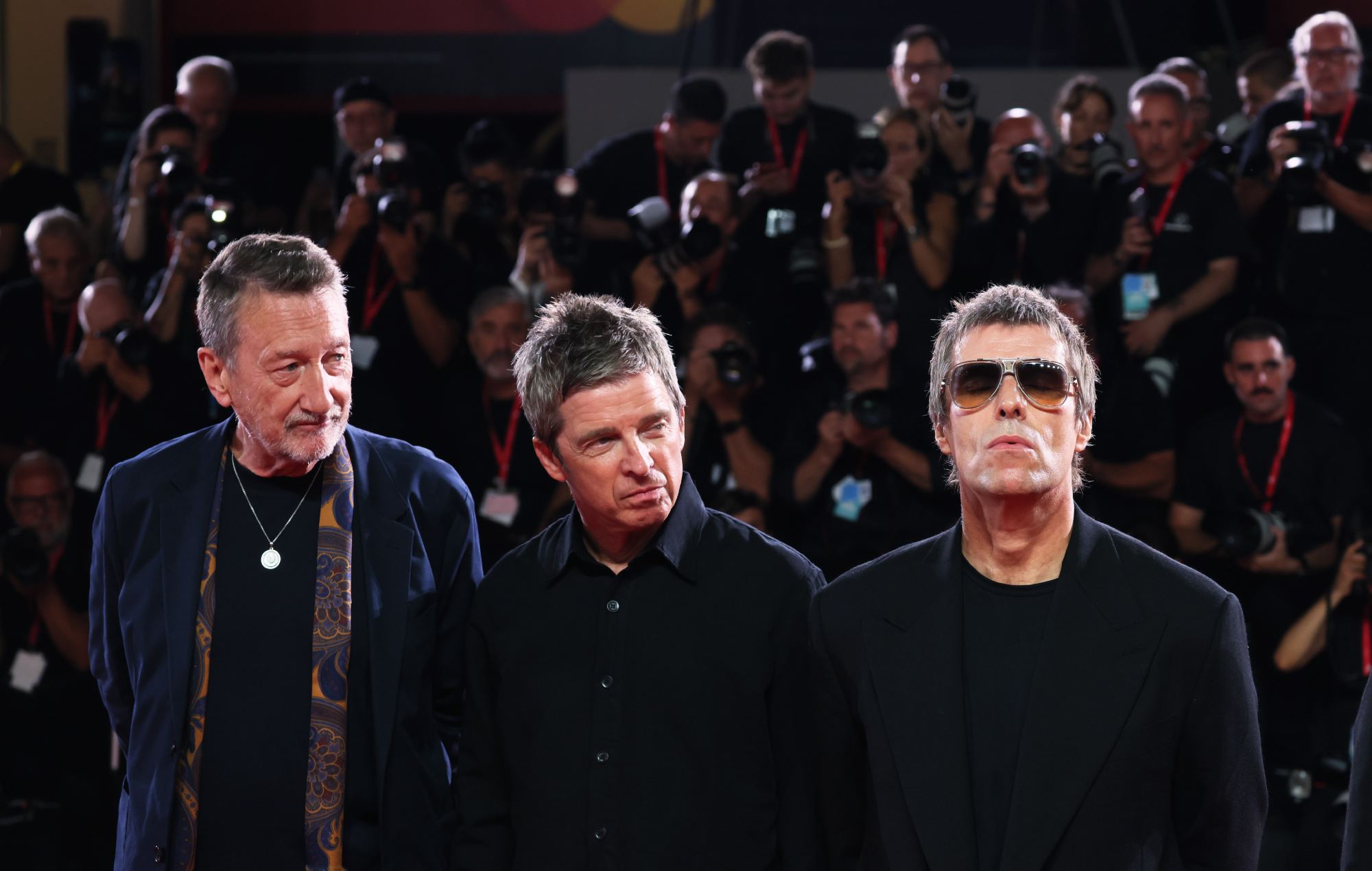Steven Knight, Noel Gallagher and Liam Gallagher attend the 'Oasis: Don't Look Back in Anger' world premiere at the Venice International Film Festival 2026 (Photo by Ernesto Ruscio/Getty Images)